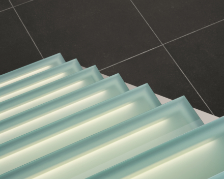 Illuminated stair with glass treads at Dusart in Hoeleden