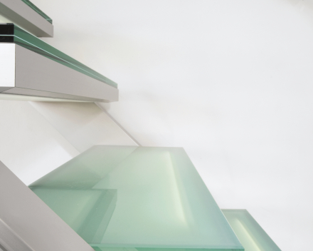 Illuminated stair with glass treads at Dusart in Hoeleden