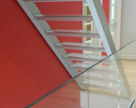 Illuminated stairs with glass treads at the familiy Haag