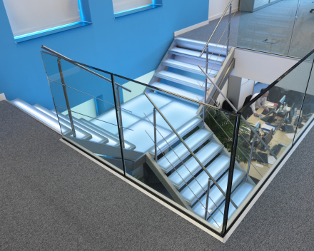 Illuminated stairs with glass treads in the offices of Mainsys