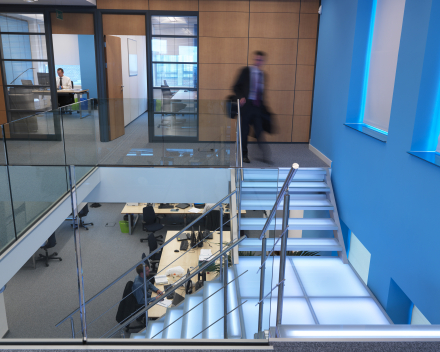 Illuminated stairs with glass treads in the offices of Mainsys