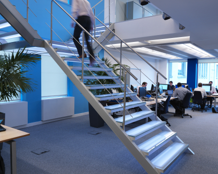 Illuminated stairs with glass treads in the offices of Mainsys