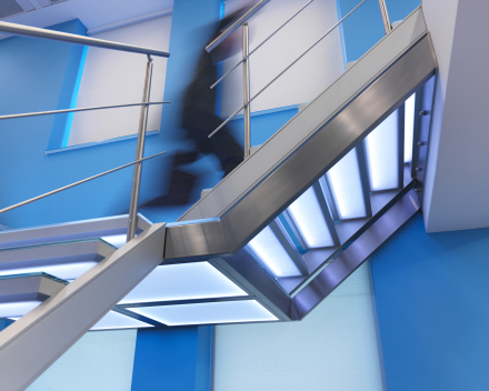 Illuminated stairs with glass treads in the offices of Mainsys