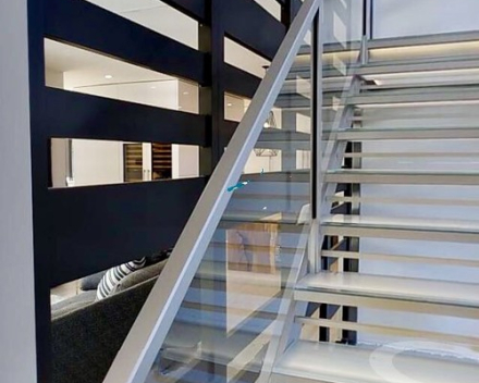 Illuminated stair with glass treads in the New American Home 2017